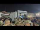 People gather outside hospital after 100 killed in Iraqi wedding fire