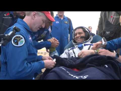 Two Russians and an American land back on Earth after ISS mission