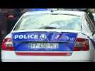 Police escort police car attacked during demonstration in Paris