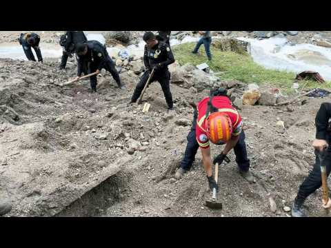 Rescuers work on site as 18 missing after river floods in Guatemala