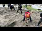 Rescuers work on site as 18 missing after river floods in Guatemala