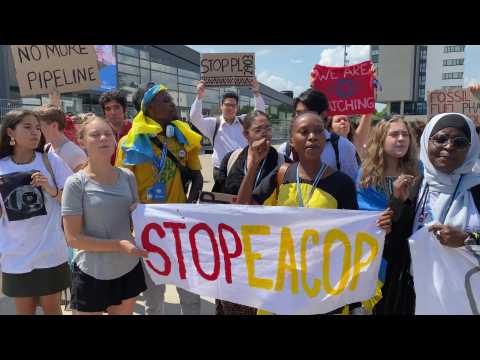 Greta Thunberg and other activists march against fossil fuel funding in Bonn, Germany