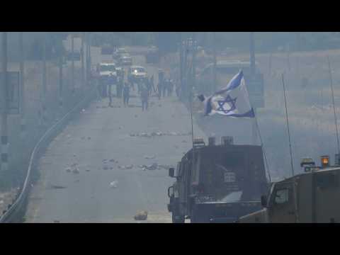 Palestinians clash with Israeli forces in Al-Bireh after Jenin raid