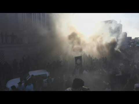 Iraqis protest outside the Swedish embassy against the burning of a Koran