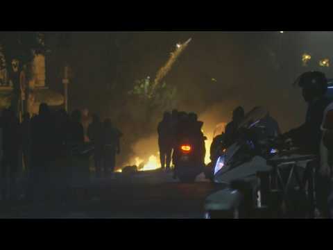 Fireworks thrown in Paris suburb as anger simmers over police shooting