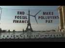 Fossil fuels: Paris protesters call for polluters to be taxed