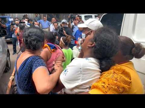 Relatives despair as Honduras prison gang battle victims moved for autopsy