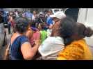 Relatives despair as Honduras prison gang battle victims moved for autopsy