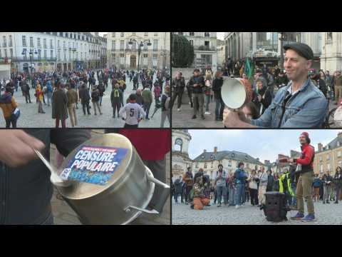 People protest in France one year after Macron's re-election