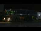 Evacuees from Sudan board a bus after British flight lands in Cyprus