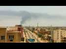 Smoke billows in Khartoum during heavy battles despite latest truce