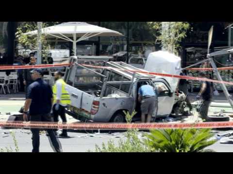 Israeli security services gather at the scene after Tel Aviv car ramming 'attack'