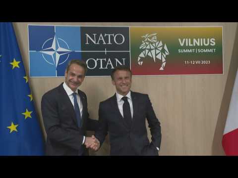 French President Macron and Greek PM Kyriakos Mitsotakis arrive for their bilateral meeting