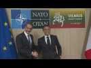 French President Macron and Greek PM Kyriakos Mitsotakis arrive for their bilateral meeting