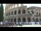 People brave scorching heatwave outside Rome's Colosseum