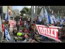 Israelis protest outside the defence ministry against judicial overhaul