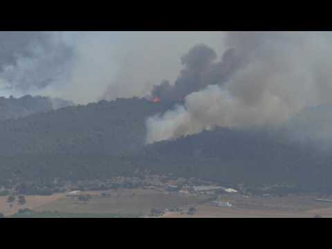 Forest fires rage near Athens as Greece battles heatwave