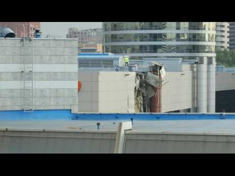 Aftermath of drone crash on non-residential building in Moscow