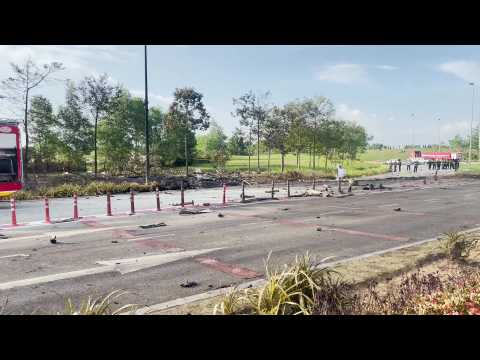 10 killed in light plane crash on street in Malaysia
