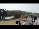 Emergency services arrive on site of deadky Pakistan train wreck