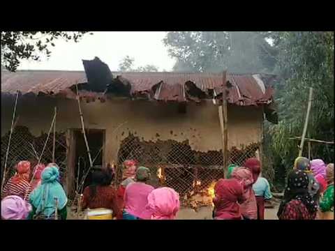 Women burn down house of accused from India naked women video