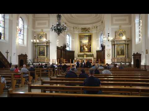 Church holds ecumenical mass after blaze kills 11 in eastern France