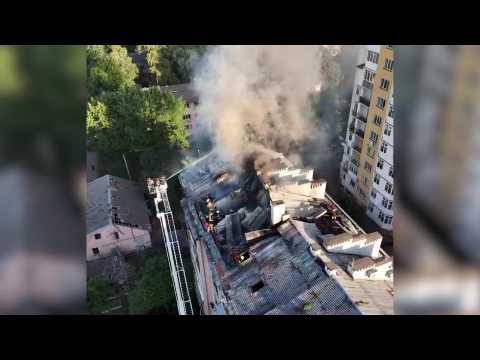 Firefighters put out a fire at residential building in Lviv after strike