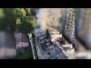 Firefighters put out a fire at residential building in Lviv after strike