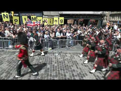 Anti-monarchists hold protest banner during Scottish coronation celebrations