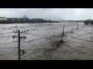 Beijing on alert as two killed by heavy rains in China