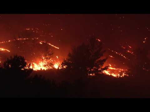 Wildfires continue to rage on Greek island of Rhodes after thousands flee