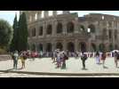 People outside Rome's Colosseum as heatwave in Italy strikes again