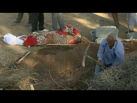Moroccans dig graves to bury victims of quake in Atlas village