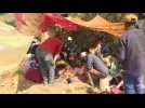 Moroccan family shelters outside after losing home, relatives in quake