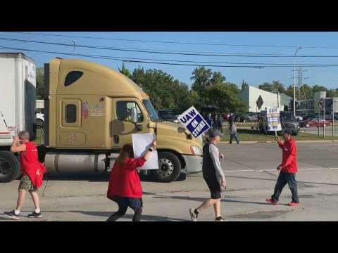 Protest outside Ford plant as US auto workers' union launches historic strike