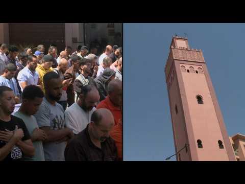 Moroccans perform Friday prayers at Marrakesh mosque