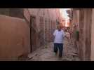 People walk amid rubble in the Jewish quarter of quake hit Marrakesh