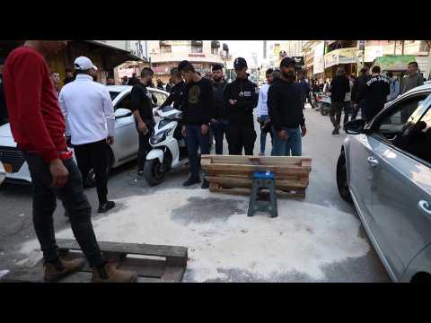 Palestinians gather on site of deadly Israeli raid in West Bank