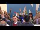 Greek PM's supporters blare air horns as exit polls show his party ahead