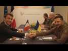 Ukraine's President Zelensky meets France's Macron at G7 summit
