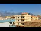 Smoke billows from buildings in south Khartoum