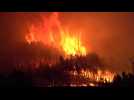 Spanish firefighters battle blaze that has forced hundreds to evacuate