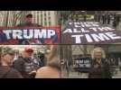 Protesters wave flags, hold up signs outside Manhattan court ahead of Trump arraignment