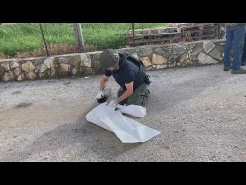 shrapnel, damaged car in northern Israeli town after rockets fired from Lebanon