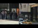 Police officers stand outside New York's Trump Tower