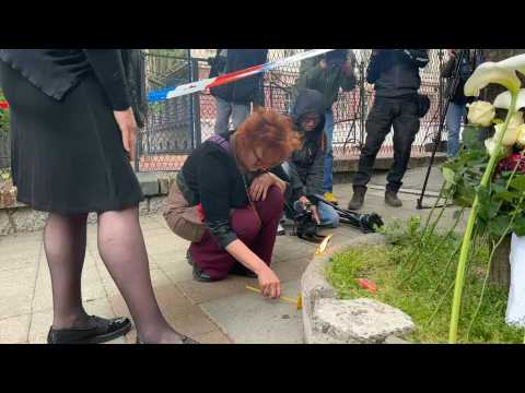 Flowers and candles laid in first tribute to victims of Belgrade school shooting