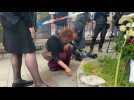 Flowers and candles laid in first tribute to victims of Belgrade school shooting