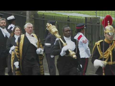 Speaker of the House of Commons Hoyle arrives for coronation with sceptre