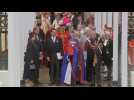 Prince Harry and Prince Andrew wait outside Westminster Abbey after Charles' Coronation
