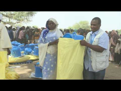 Sudanese refugees in neighboring Chad receive humanitarian aid